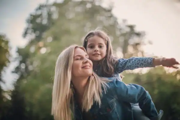 happy mum and daughter following mediation to resolve parental alienation Ealing